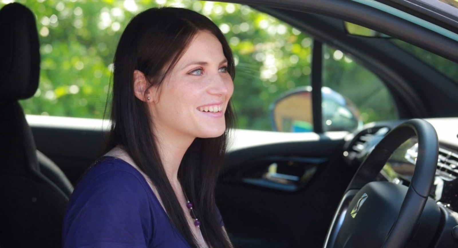 Woman driving a car